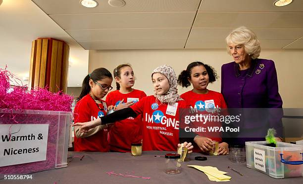 Camilla, Duchess of Cornwall speaks to children attending the 'Imagine' festival during a preview of the new 'Wondercrump World of Roald Dahl'...