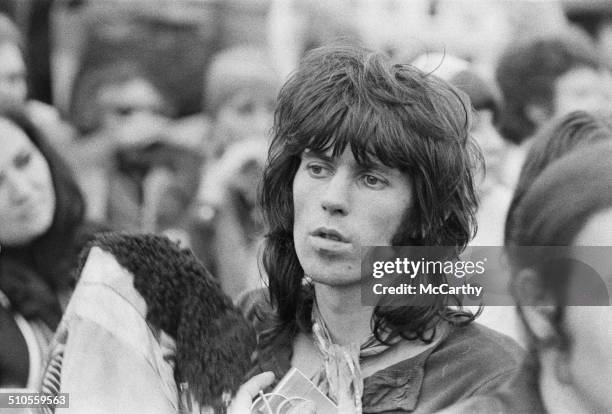 Rolling Stones guitarist Keith Richards amongst the crowd during the Isle of Wight Festival, 31st August 1969.