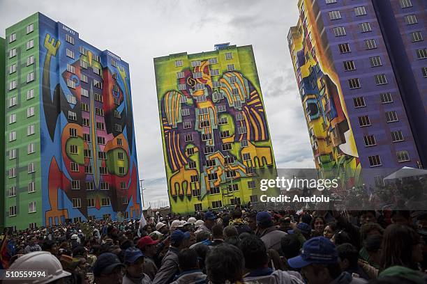 People attend the inauguration of the new buildings of the residential area 'Wiphala', a government's social housing project where renowned Aymara...
