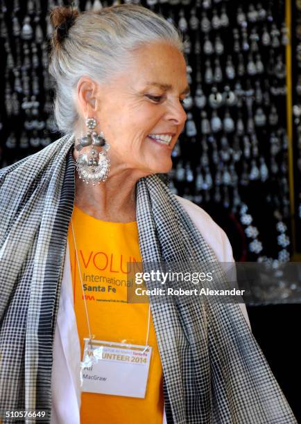 Film star Ali MacGraw works as a volunteer at the annual International Folk Art Market in Santa Fe, New Mexico. The actress is a resident of Santa Fe...