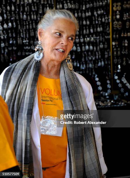 Film star Ali MacGraw works as a volunteer at the annual International Folk Art Market in Santa Fe, New Mexico. The actress is a resident of Santa Fe...