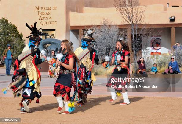 The Dineh Tah Navajo Dancers perform a traditional Native-American dance at the Museum of Indian Arts and Culture in Santa Fe, New Mexico.