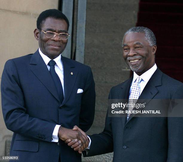 South African President Thabo Mbeki welcomes his counterpart President Teodoro Obiang Nguema M'Basogo of Equitorial Guinea at Pretoria's Union...