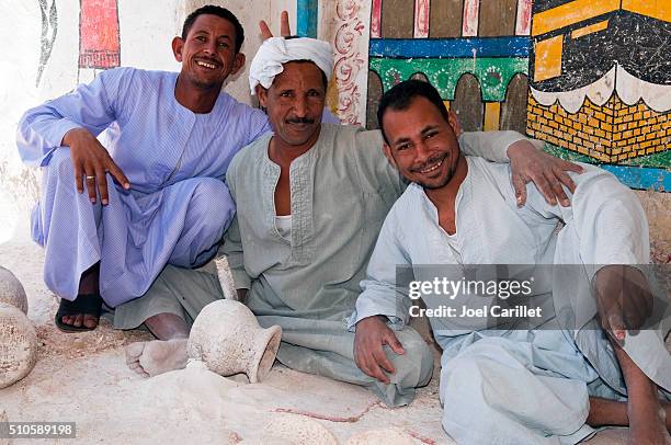 egyptian men at alabaster factory in luxor, egypt - egyptian people stock pictures, royalty-free photos & images