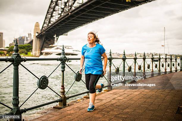 woman running - sydney harbour people stock pictures, royalty-free photos & images