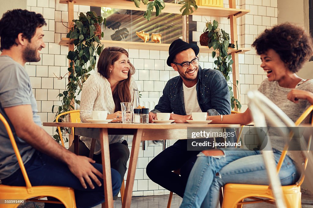Friends having a great time in cafe