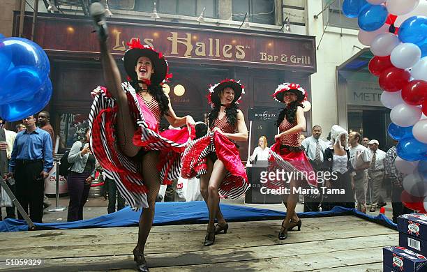 Cancan dancers perform during the Brasserie Les Halles Bastille Races and Liberty Festival July 14, 2004 in New York City. The 11-day celebration in...