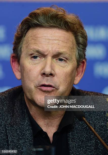 Screenwriter John Logan attends a press conference for the film "Genius" screened in competition of the 66th Berlinale Film Festival in Berlin on...