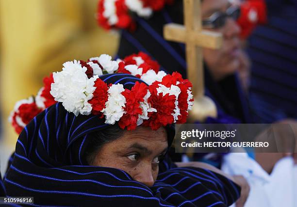 Purepecha native woman waits for the arrival of pope Francis at Francisco J. Mujica airport in Morelia, Michoacan State, Mexico on February 16, 2016....