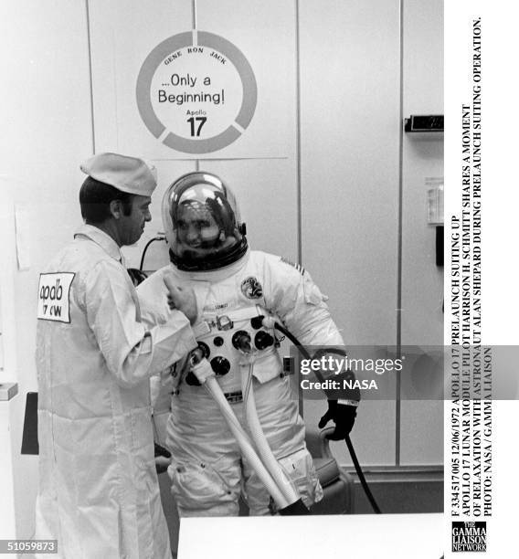 Apollo 17 Prelaunch Suiting Up Apollo 17 Lunar Module Pilot Harrison H. Schmitt Shares A Moment Of Relaxation With Astronaut Alan Shepard During...