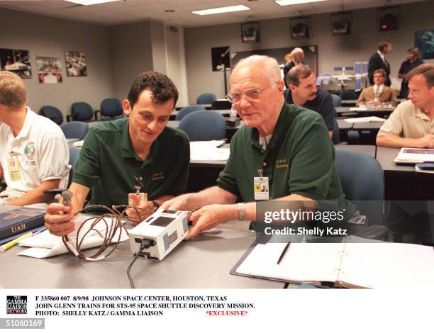 Johnson Space Center, Houston, Texas John Glenn Trains For Sts-95 Space Shuttle Discovery Mission.