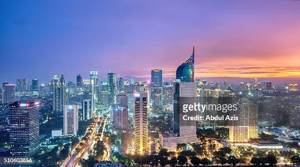 jakarta sunset - indonesia stock pictures, royalty-free photos & images