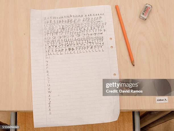 An exercise of Latin calligraphy made by a refugee child is seen in a school on February 8, 2016 in Halmstad, Sweden. Last year Sweden received...