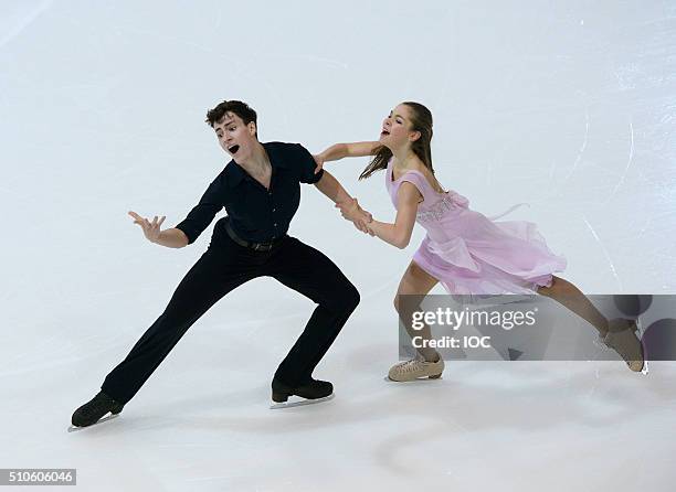 In this handout image supplied by the IOC, Gold Medal winners Anastasia Shpilevaya and Grigory Smirnov of Russia perform their Free Dance during the...