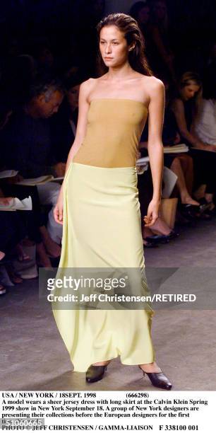 Usa / New York / 18Sept. 1998 A Model Wears A Sheer Jersey Dress With Long Skirt At The Calvin Klein Spring 1999 Show In New York September 18. A...