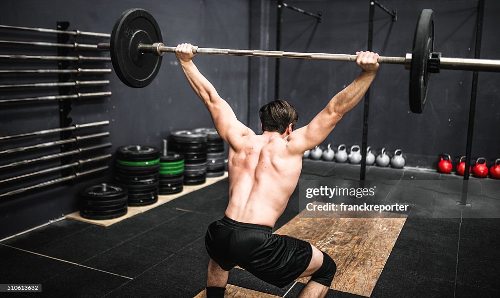 Strong man weightlifting a barbell