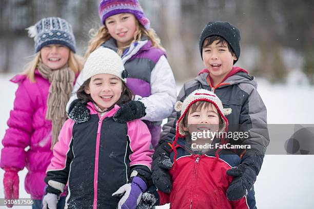 children spending time outdoors - family ice skate stock pictures, royalty-free photos & images