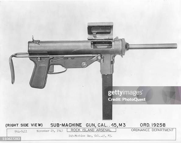 Submachine Side View Right side view of a US M3 45 Cal submachine gun, also known as the ...
