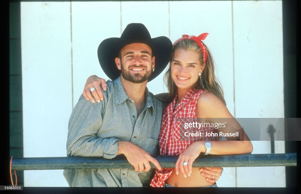 Tennis Player Andre Agassi Stands With His Girlfriend Brooke Shields April 1997 In Califo...