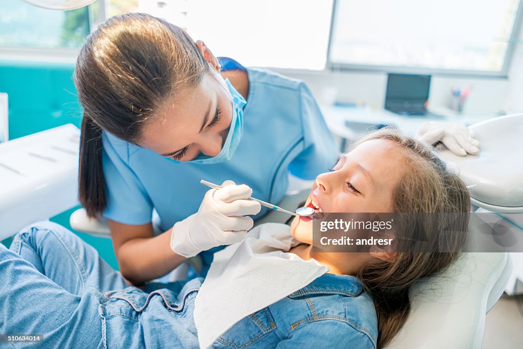 Beautiful girl at the dentist