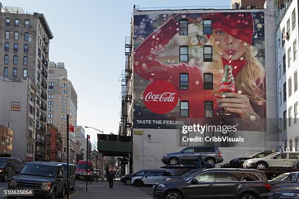 lafayette street new york with a painted coca-cola billboard - drinking soda in car stock pictures, royalty-free photos & images