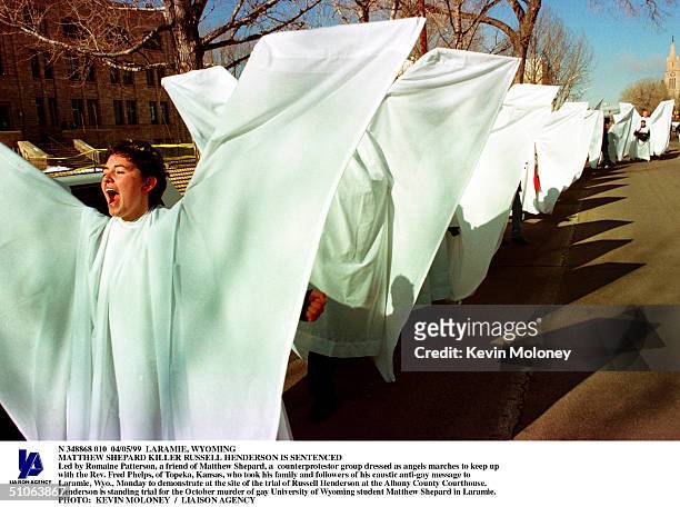Led By Romaine Patterson, A Friend Of Matthew Shepard, A Counterprotestor Group Dressed As Angels Marches To Keep Up With The Rev. Fred Phelps, Of...