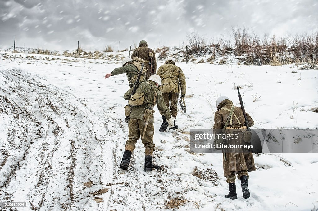 WWII US Military Squadron On Patrol In A Winter Blizzard