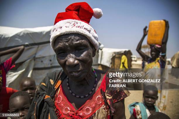 Nyakier Kuong, a displaced woman from Bentiu, is pictured at the Protection of Civilians site in Bentiu, South Sudan, on February 16, 2016. Nyakier,...