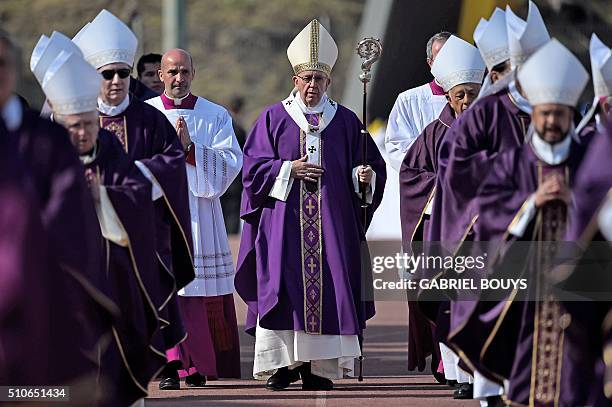 Pope Francis officiates an open-air mass at the Guadalupe Basilica in Mexico City on February 13, 2016. The pope urged Mexican bishops Saturday to...