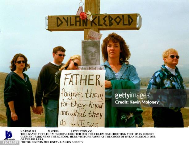 29Apr99 Littleton, Co Thousands Visit The Memorial Erected For The Columbine Shooting Victims In Robert Clement Park Near The School. Here Visitors...