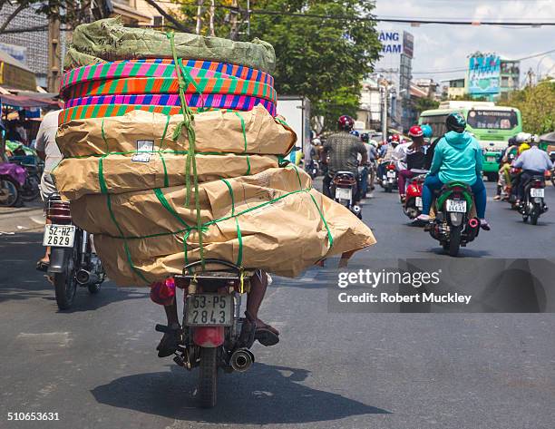 Mobed Loading Moped With Load Photos and Premium High Res Pictures - Getty Images