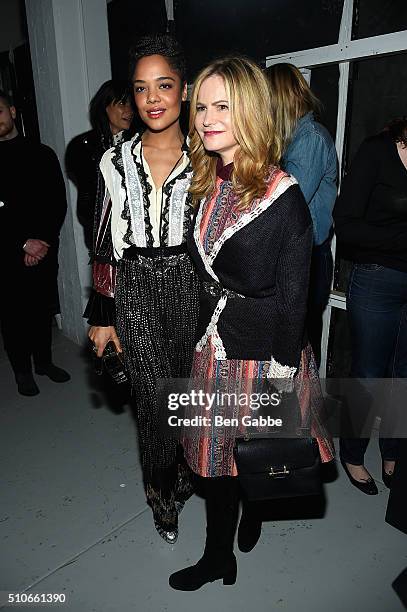 Actresses, Tessa Thompson, and Jennifer Jason Leigh pose at the Rodarte Fall 2016 fashion show during New York Fashion Week on February 16, 2016 in...