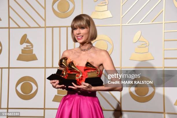 Taylor Swift poses in the press room at the The 58th GRAMMY Awards at Staples Center on February 15, 2016 in Los Angeles, California. AFP PHOTO/MARK...