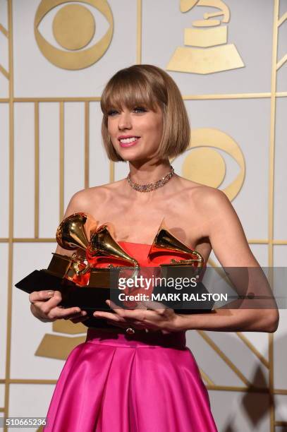 Taylor Swift poses in the press room at the The 58th GRAMMY Awards at Staples Center on February 15, 2016 in Los Angeles, California. AFP PHOTO/MARK...