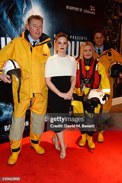Holliday Grainger poses with members of the Royal National Lifeboat Institution at "The Finest Hours" Gala Premiere at the Ham Yard Hotel on February...