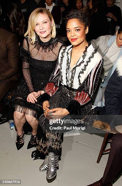 Actresses Kristen Dunst and Tessa Thompson attend the Rodarte Fall 2016 fashion show during New York Fashion Week on February 16, 2016 in New York...