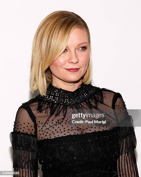 Actress Kristen Dunst poses for a photo at the Rodarte Fall 2016 fashion show during New York Fashion Week on February 16, 2016 in New York City.