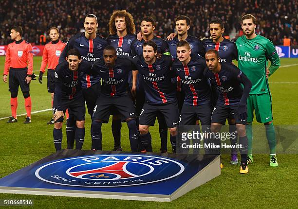 Players line up prior to the UEFA Champions League round of 16 first leg match between Paris Saint-Germain and Chelsea at Parc des Princes on...