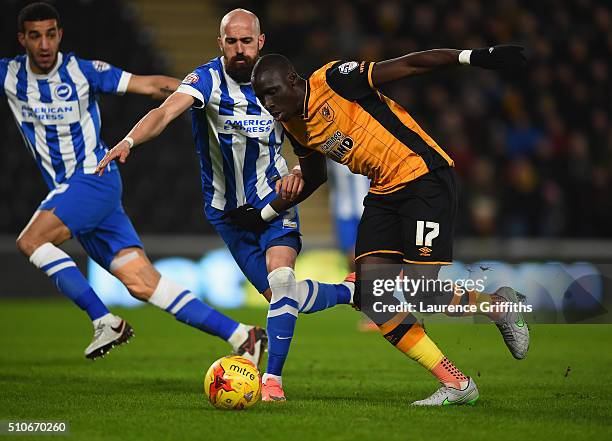 Bruno of Brighton battles with Mo Diame of Hull City during the Sky Bet Championship match between Hull City and Brighton and Hove Albion at KC...