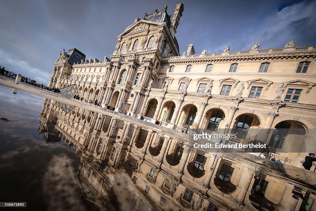 Paris Buildings Reflect Into Puddles