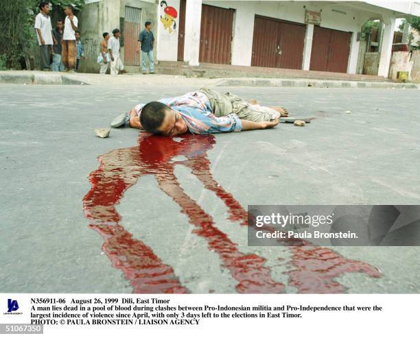 August 26, 1999 Dili, East Timor A Man Lies Dead In A Pool Of Blood During Clashes Between Pro-Indonesian Militia And Pro-Independence That Were The...