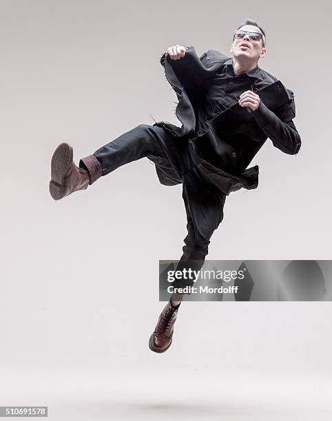 male fashion model. crazy jumps - wearing white clothes stock pictures, royalty-free photos & images