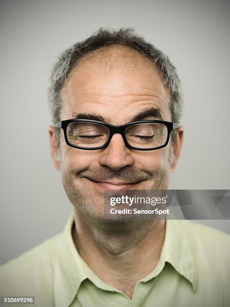 portrait of a funny caucasian real man - satisfaction bildbanksfoton och bilder