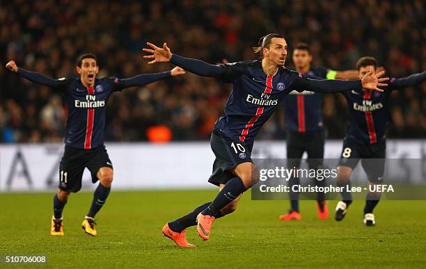 Zlatan Ibrahimovic of Paris Saint-Germain celebrates as he scores their first goal from a free kick during the UEFA Champions League round of 16...