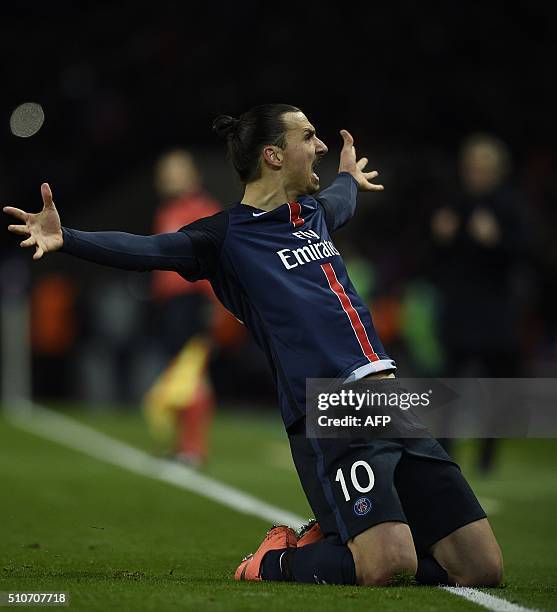 Paris Saint-Germain's Swedish forward Zlatan Ibrahimovic celebrates after scoring a goal during the Champions League round of 16 first leg football...