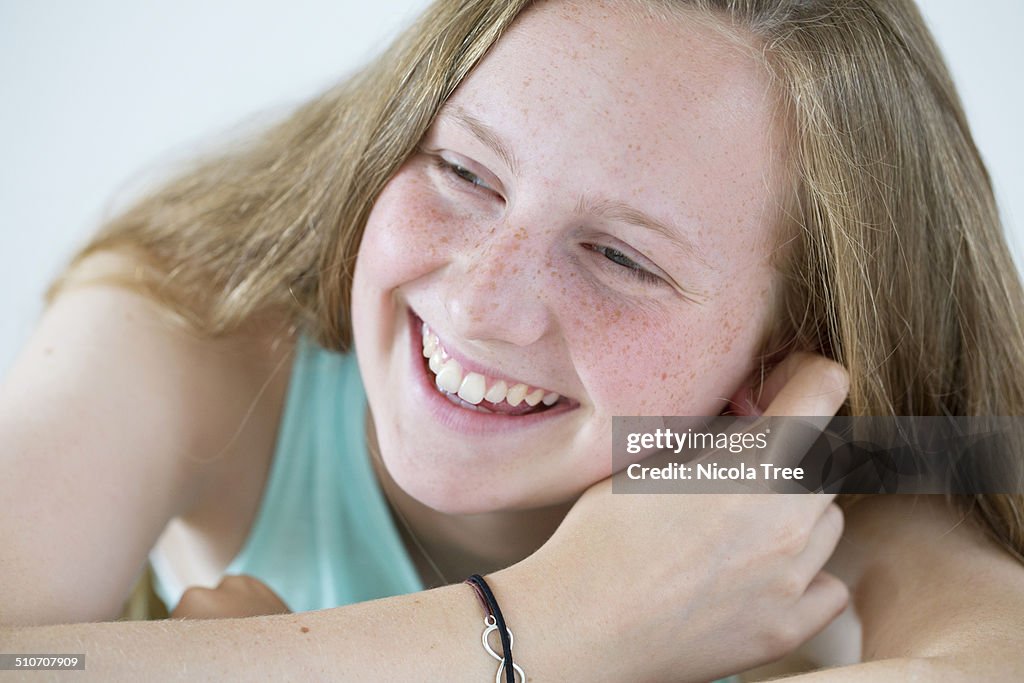 Close up of a teenage girl laughing and having fun