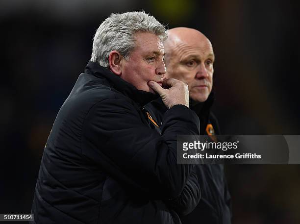 Steve Bruce and Mike Phelan of Hull City looks on during the Sky Bet Championship match between Hull City and Brighton and Hove Albion at KC Stadium...