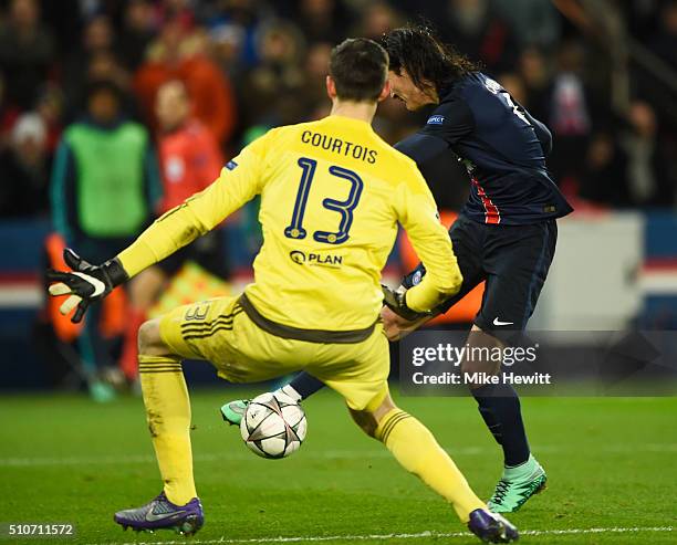 Edinson Cavani of Paris Saint-Germain shoots past Thibaut Courtois of Chelsea to score their second goal during the UEFA Champions League round of 16...