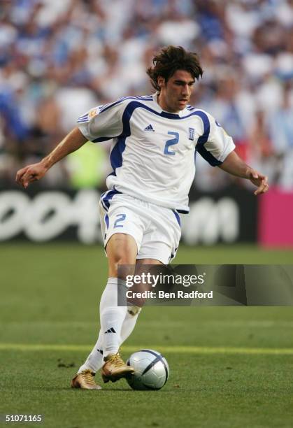 Giourkas Seitaridis of Greece runs with the ball during the UEFA Euro 2004 Final match between Portugal and Greece held on July 4, 2004 at the...