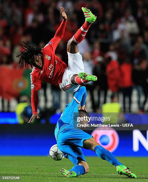 Renato Sanches of Benfica and Javi Garcia of FC Zenit challenge for the ball during the first leg of the UEFA Champions League Round of 16 match...